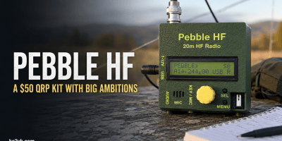 Pebble HF 20-meter QRP radio on a field table beside the headline “A $50 QRP Kit With Big Ambitions.